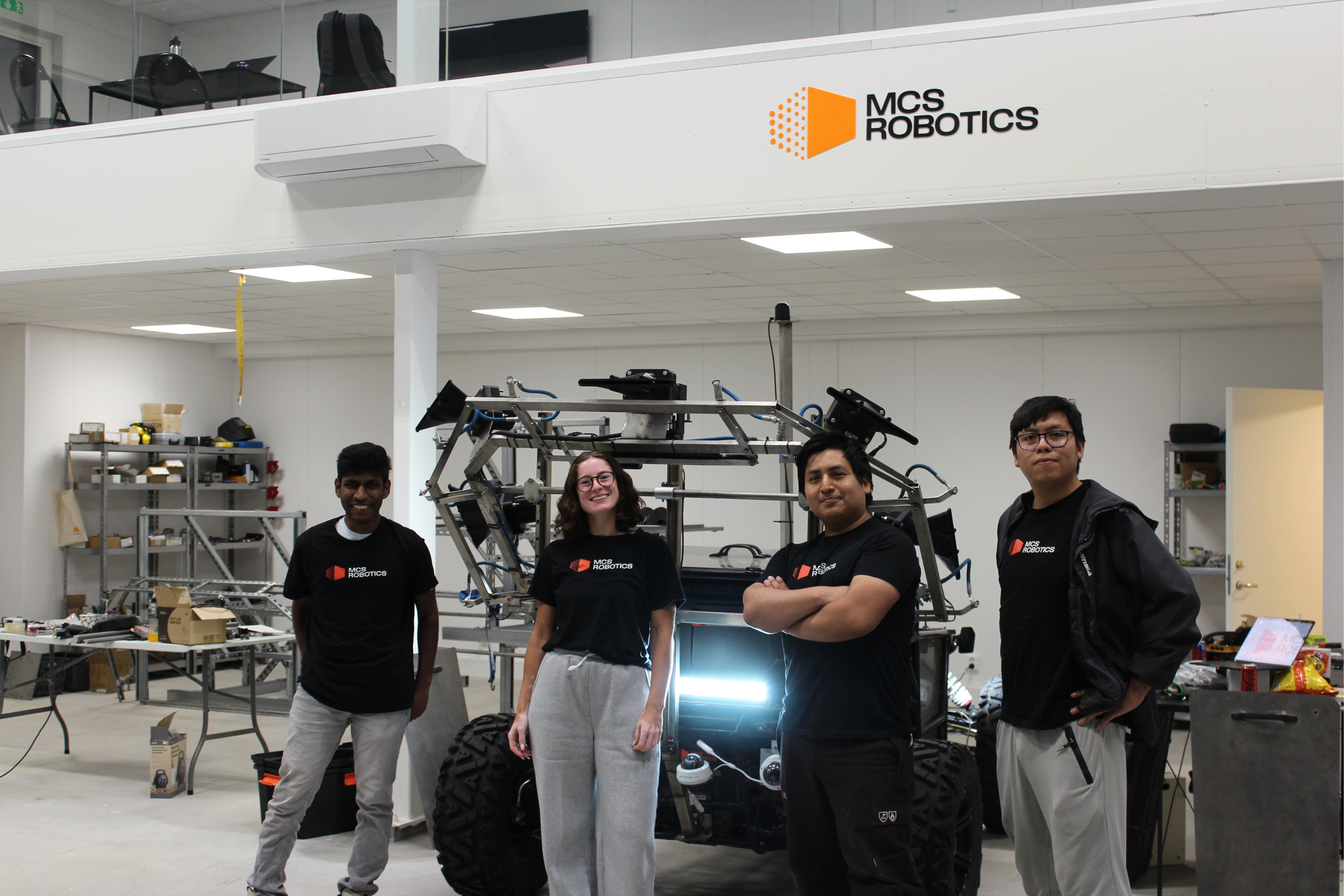The MCS Robotics team in the workshop