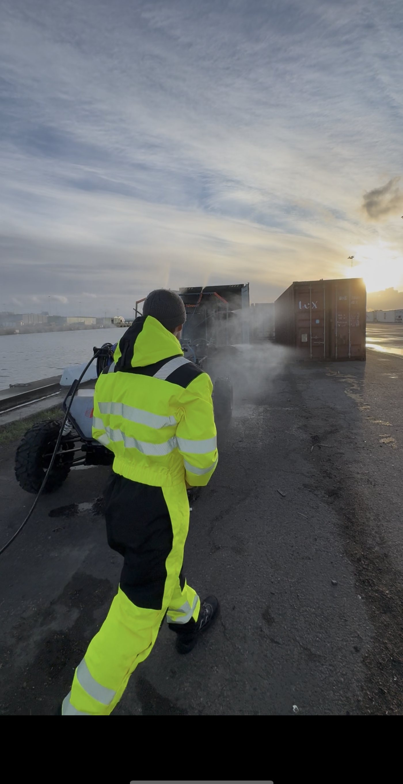 A member of the MCS Robotics team operating Box Cleaner at a container terminal